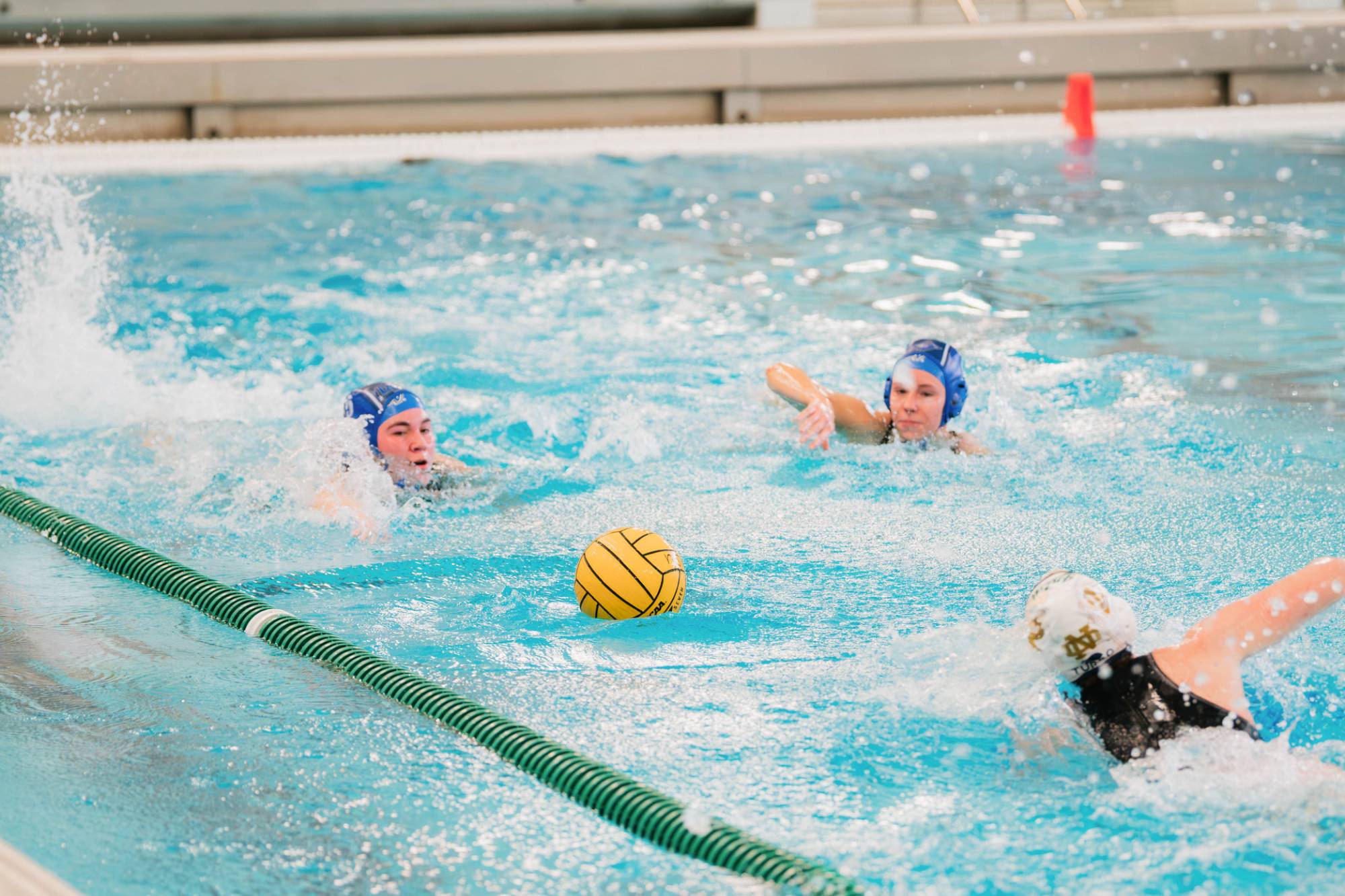 Players sprinting at the start of the game to get to the ball